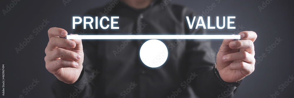 Male hand writes in screen Price and Value. Male hand writes in screen Price and Value.
