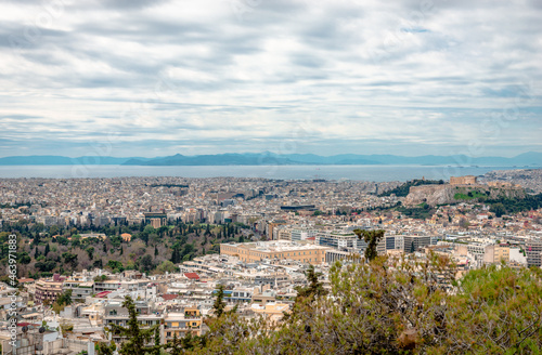 Panoramic view of Athens from Lycabettus Hill. From left to right, the National Garden, the Greek Parliament and the Acropolis. Faliron, Piraeus and the Saronic Gulf are in the background. © Apostolis Giontzis