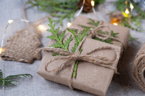 Christmas gifts in craft packaging. Christmas and New Year holidays background, selective focus