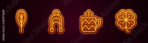 Set line Leaf, Winter hat, Cup of tea and Four leaf clover. Glowing neon icon. Vector