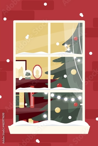 View through the window into the living room with a Christmas tree.