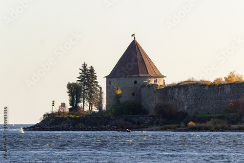 Russia  Saint Petersburg  09.10.2021. Oreshek Fortress is an ancient Russian fortress on Orekhov Island at the source of the Neva River at autumn. Petrokrepost Bay aerial view.