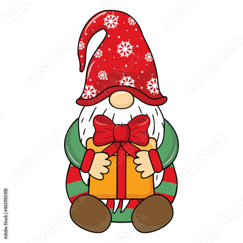 Christmas gnome with a gift in his hands