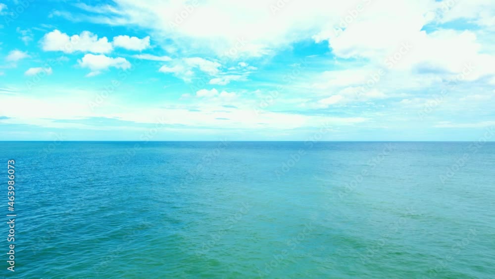 4K Aerial view of drone move on beautiful sea, Flight over ocean. Dynamic aerial shot. Perfect for holiday summer background. Drone 4k shot.
4K Aerial view of drone move on beautiful sea, Flight over ocean. Dynamic aerial shot. Perfect for holiday summer background. Drone 4k shot.