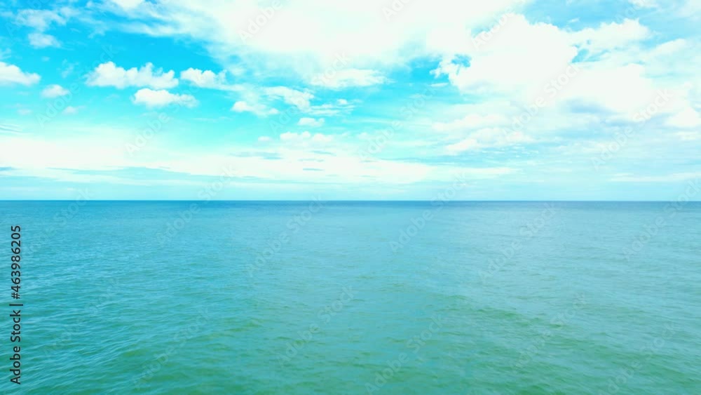 4K Aerial view of drone move on beautiful sea, Flight over ocean. Dynamic aerial shot. Perfect for holiday summer background. Drone 4k shot.
4K Aerial view of drone move on beautiful sea, Flight over ocean. Dynamic aerial shot. Perfect for holiday summer background. Drone 4k shot.