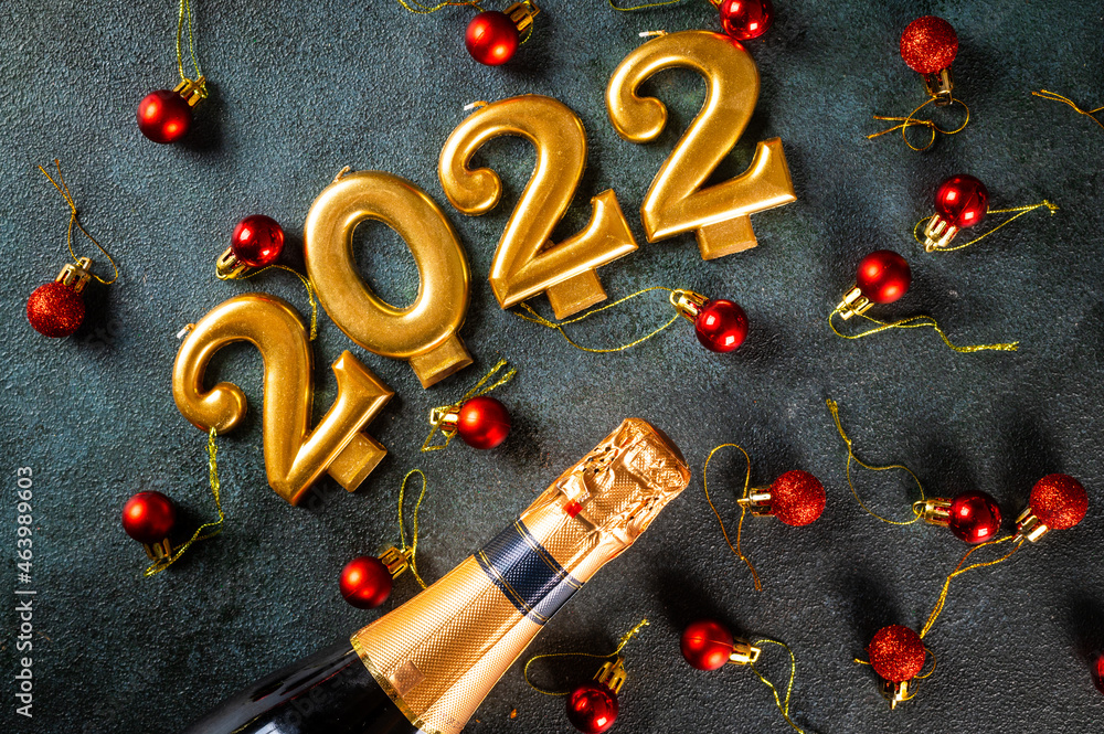 2022 numbers with champagne bottle and decor. Happy new year and festive concept. Top horizontal view copyspace. New Year Flatly. Christmas flatlay. New year 2022. New year concept. 2022 numbers with champagne bottle and decor. Happy new year and festive concept. Top horizontal view copyspace. New Year Flatly. Christmas flatlay. New year 2022. New year concept.