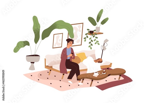 Woman on sofa with mobile phone in living room. Person use smartphone and soc...