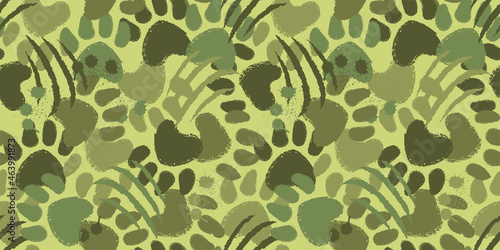 Camouflage seamless pattern with animal paw prints and claws scratches. Dog or cat hand drawn paw print background.