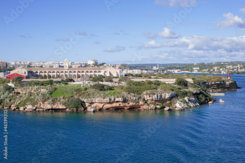 L'Illa del Rei Hospital Island in the middle of the main navigable entry channel to Mahon in Menorca in the Mediterranean Sea © Alevtina