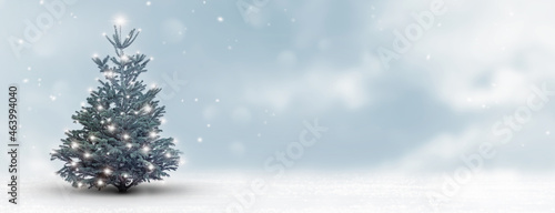christbaum in weißer winterlandschaft, konzept für weihnachten oder neujahr mit textfreiraum photo