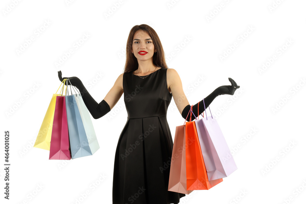 Girl with multicolored paper bags isolated on white background