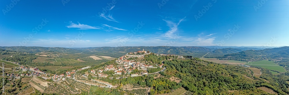 Drone panorama on historical Croatian town Motovun in Istria during daytime with clear sky and sunshine