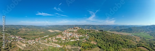 Drone panorama on historical Croatian town Motovun in Istria during daytime with clear sky and sunshine