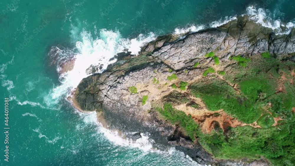 Aerial view Drone camera top down of seashore rocks in a blue ocean Turquoise sea surface Amazing sea waves crashing on rocks seascape Aerial view drone 4k High quality of ocean with stone rock cliff Aerial view Drone camera top down of seashore rocks in a blue ocean Turquoise sea surface Amazing sea waves crashing on rocks seascape Aerial view drone 4k High quality of ocean with stone rock cliff