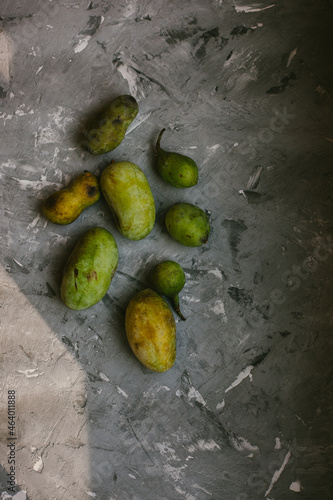 Fresh PawPaw Fruit Arranged On a Gray Textured Background