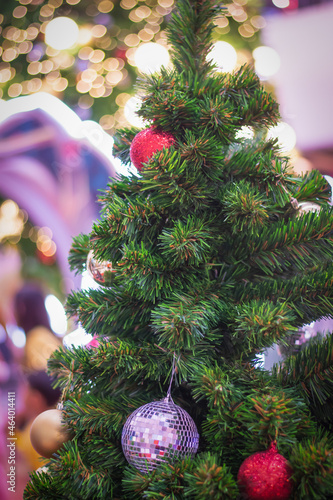 Decorate Christmas tree on blurry  sparkling and bokeh background.