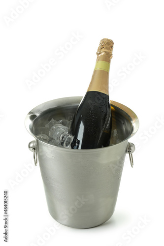 Metal bucket with ice and Champagne bottle isolated on white background