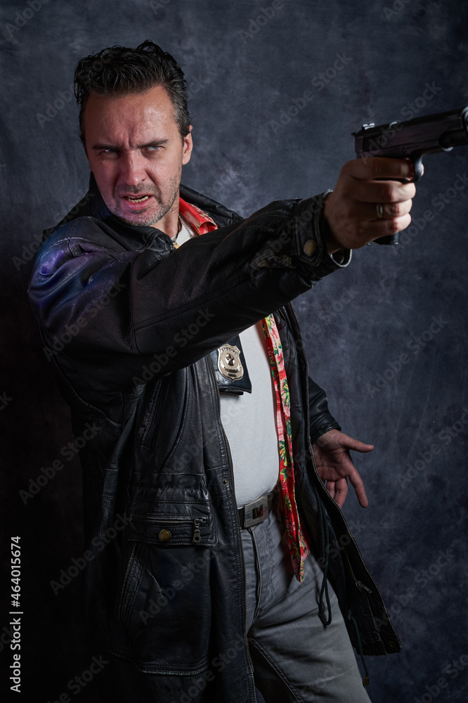 Naklejka premium Undercover cop on a dark background, a policeman at work, tough detective, fake badge