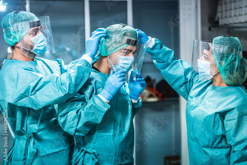 Photography Doctors and nurse preparing to work in hospital for surgical operation during co