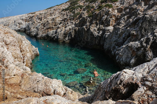 Little Bay with swimmers, at Katholiko cave, Crete