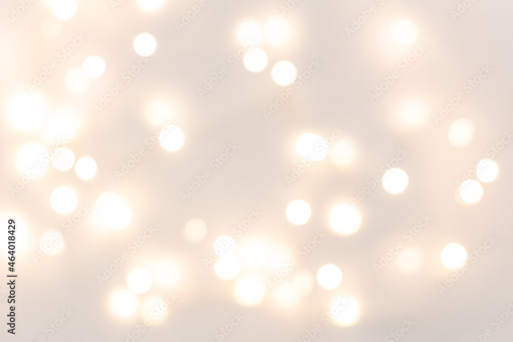 Defocus Christmas lights on a grey background. Copy space
