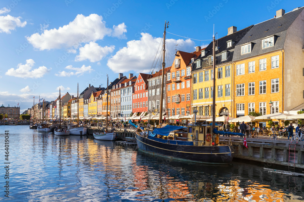 Old town of Copenhagen, famous tourist spot Nyhavn district with colorful houses and historic boats
