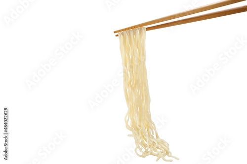 .chopsticks picking up noodles isolated on white background..