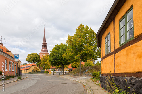 Church, old square and small houses at Nysted, Lolland, Denmark