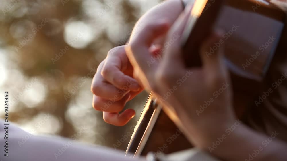 Musician's fingers play a slow melody fingering. Autumn. Musician's fingers play a slow melody fingering. Autumn.