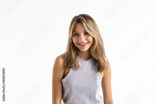 Young woman portrait isolated over white background.