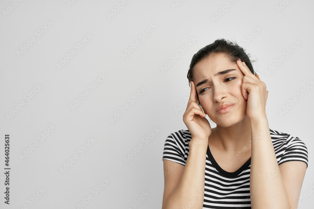 sick woman in a striped t-shirt pain in the neck health problems sick woman in a striped t-shirt pain in the neck health problems