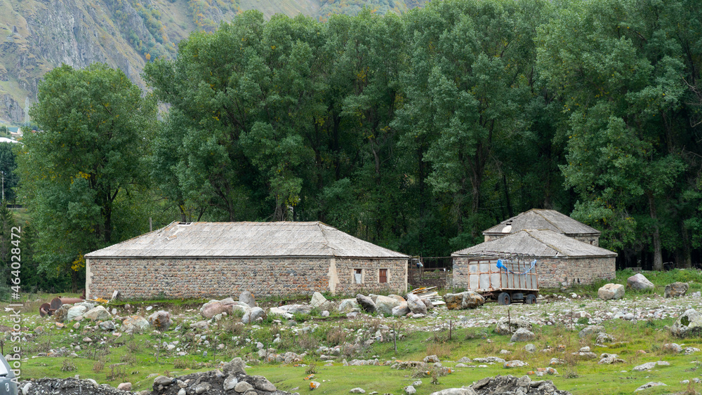 old stone houses in the mountains.