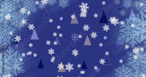 Image of snow falling christmas tree pattern on blue background