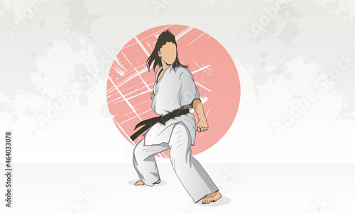 A young woman trains in martial arts a type of karate.