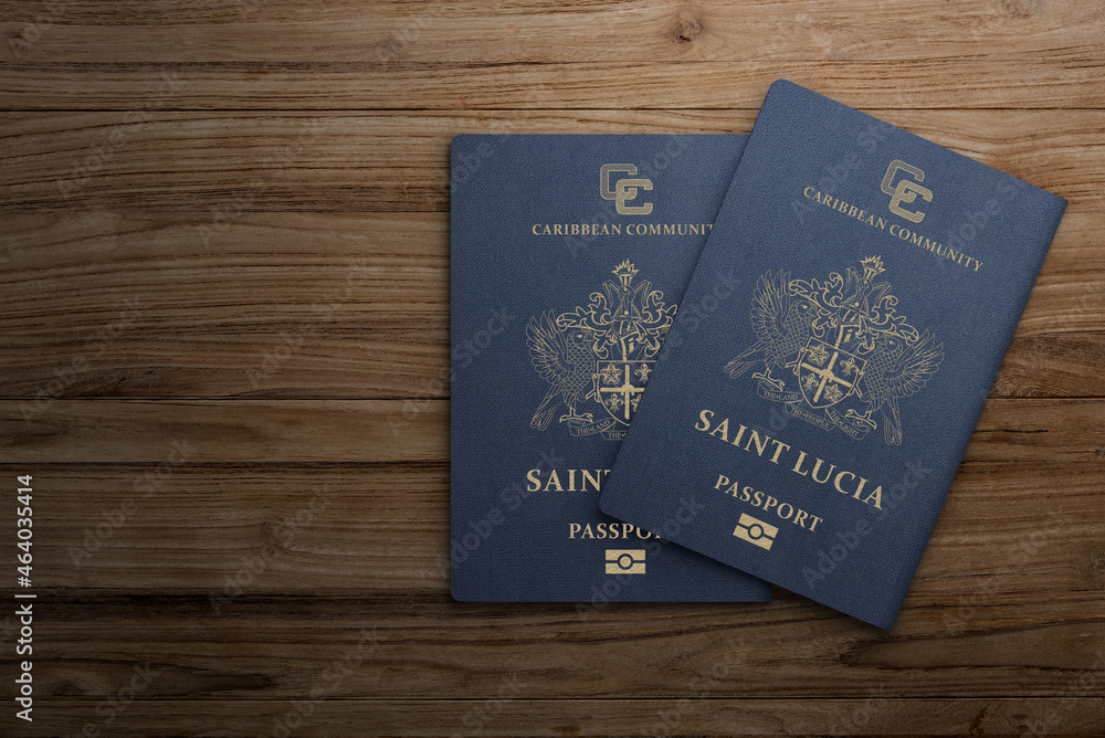 saint lucia passport on wooden background citizenship by investment saint lucia passport on wooden background citizenship by investment