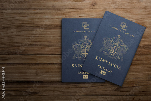saint lucia passport on wooden background citizenship by investment