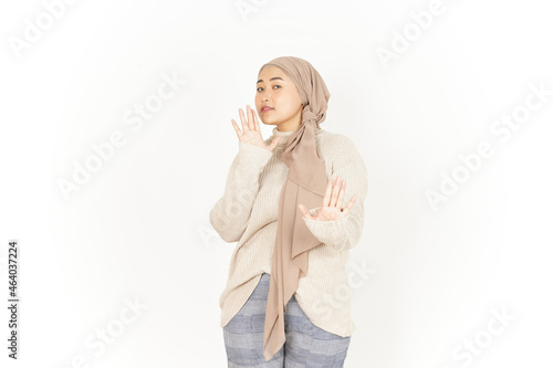 Stop or Rejection Gesture of Beautiful Asian Woman Wearing Hijab Isolated On White Background