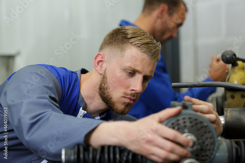 a mechanic is assembling parts