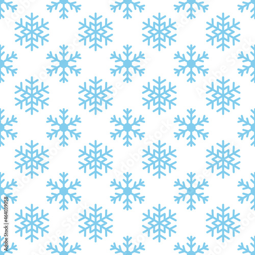 Seamless winter background of snowflakes arranged in regular rows. Winter fairy tale, Christmas symbol.