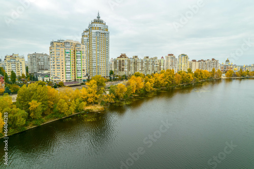 Aerial view of the city by the river in autumn © Sharapov Oleh