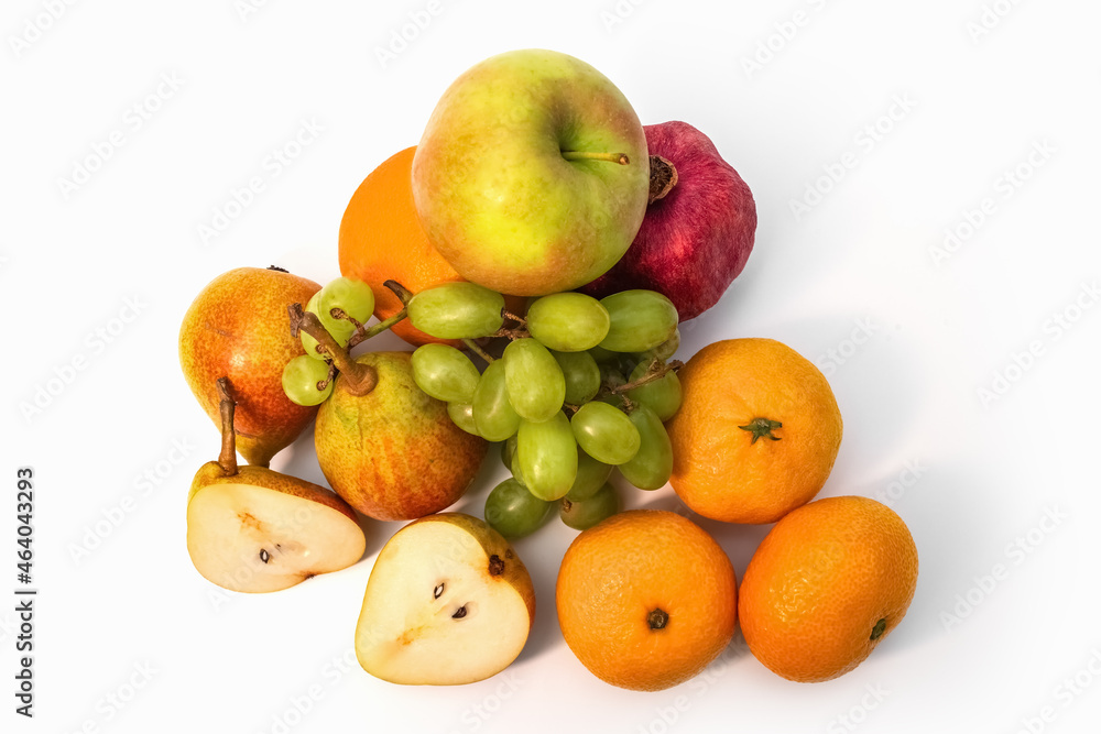 Ripe fruits on a white background. Pears, grapes and tangerines on a white background. Flat lay. Photo Ripe fruits on a white background. Pears, grapes and tangerines on a white background. Flat lay. Photo