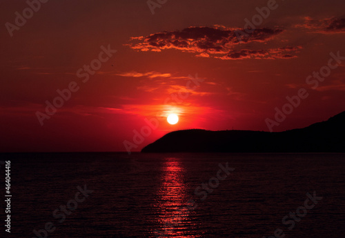 Beautiful Orange - red sunset over the sea