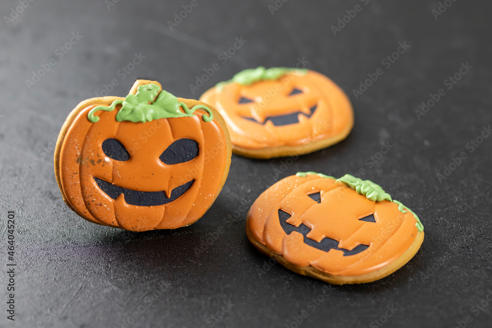 Bright happy Halloween gingerbread cookies on a black background Bright happy Halloween gingerbread cookies on a black background