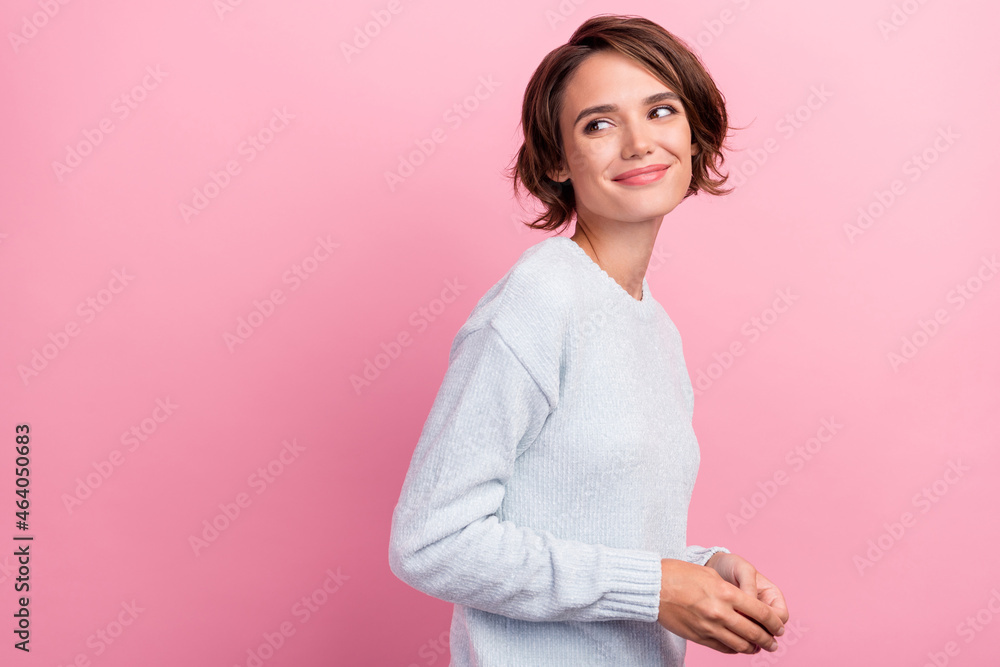 Photo of charming happy positive nice young woman look empty space enjoy smile isolated on pink color background Photo of charming happy positive nice young woman look empty space enjoy smile isolated on pink color background