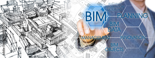 Planning a new city with BIM, Building Information Modeling system, a new way of architecture designing - concept with an engineer or architect drawing a sketch of a new modern imaginary town 