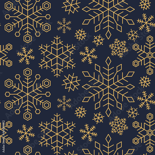 Christmas, New Year seamless pattern of gold snowflakes on dark blue background.Snowflakes in different shapes and forms.Vector Illustration