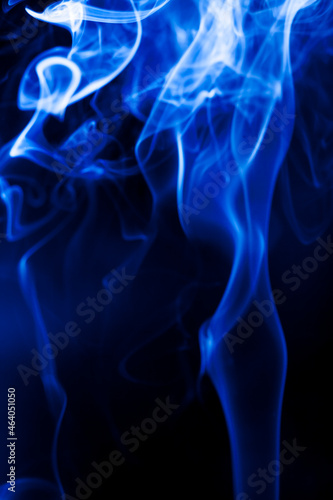 Motion blue smoke on black background.