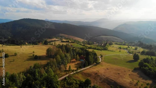 Aerial View of Green Hills of Pester Plateau, Mountain Region in Western Serbia on Summer Day, Drone Shot