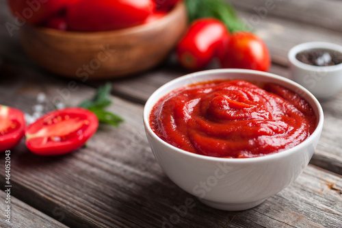 Wallpaper Mural Homemade tomato sauce in white bowl, fresh tomatoes, spices and herbs. Food background Torontodigital.ca