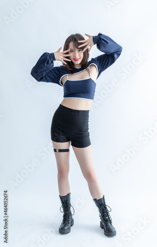 Fototapeta Attractive woman wearing camisole and shorts